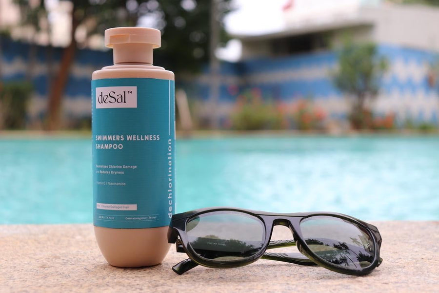 deSal Swimmers Wellness Shampoo with sunglasses at the poolside