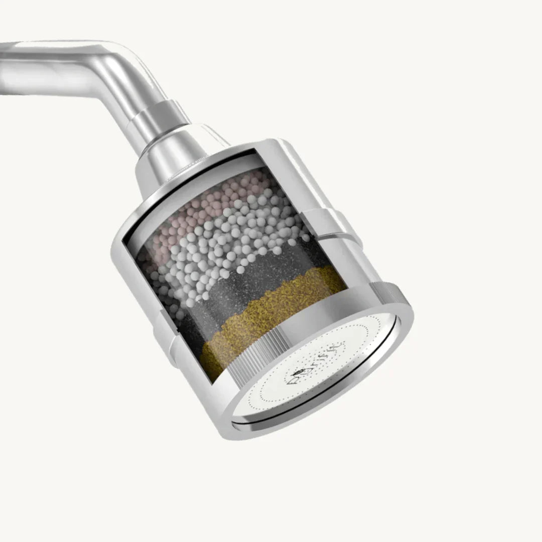 A shower filter head, illustrating why it cannot undo existing hard water damage